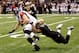 NEW ORLEANS, LA - DECEMBER 26: Tight end Michael Palmer #81 of the Atlanta Falcons runs after a catch as middle linebacker Jonathan Vilma #51 of the New Orleans Saints dives for the tackle in the third quarter at the Mercedes-Benz Superdome on December 26, 2011 in New Orleans, Louisiana. (Photo by Chris Graythen/Getty Images)