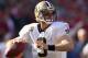 SAN FRANCISCO, CA - JANUARY 14: Drew Brees #9 of the New Orleans Saints looks to pass from the pocket against the San Francisco 49ers during the NFC Divisional playoff game at Candlestick Park on January 14, 2012 in San Francisco, California. The 49ers won the game 36-32. (Photo by Ezra Shaw/Getty Images)