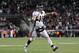 FOXBORO, MA - JANUARY 14: Tim Tebow #15 of the Denver Broncos throws a pass against the New England Patriots during their AFC Divisional Playoff Game at Gillette Stadium on January 14, 2012 in Foxboro, Massachusetts. (Photo by Jim Rogash/Getty Images)