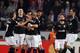 EINDHOVEN, NETHERLANDS - MARCH 15: Sofiane Feghouli (#8) of Valencia is congratulated by team mates after he scores the first goal of the game during the UEFA Europa League round of 16 second leg match between PSV Eindhoven and Valencia at Philips Stadion on March 15, 2012 in Eindhoven, Netherlands. (Photo by Dean Mouhtaropoulos/Getty Images)