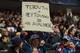 DENVER, CO - MARCH 20: A fan displays a sign referencing Denver Broncos quarterbacks Tim Tebow and Peyton Manning as the Colorado Avalanche host the Calgary Flames at Pepsi Center on March 20, 2012 in Denver, Colorado. (Photo by Doug Pensinger/Getty Images)