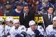 GLENDALE, AZ - FEBRUARY 28: Head coach Alain Vigneault of the Vancouver Canucks watches from the bench during the NHL game against the Phoenix Coyotes at Jobing.com Arena on February 28, 2012 in Glendale, Arizona. (Photo by Christian Petersen/Getty Images)