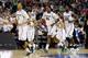 COLUMBUS, OH - MARCH 18: Brandan Kearney #3, Brandon Wood #30, Derrick Nix #25, Travis Trice #20 and Draymond Green #23 of the Michigan State Spartans run to the bench for a timeout against the Saint Louis Billikens during the third round of the 2012 NCAA Men's Basketball Tournament at Nationwide Arena on March 18, 2012 in Columbus, Ohio. (Photo by Rob Carr/Getty Images)