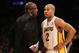 LOS ANGELES, CA - MARCH 11: Head coach Mike Brown of the Los Angeles Lakers talks with Derek Fisher #2 during hte game against the Boston Celtics at Staples Center on March 11, 2012 in Los Angeles, California. The Lakers won 97-94. NOTE TO USER: User expressly acknowledges and agrees that, by downloading and or using this photograph, User is consenting to the terms and conditions of the Getty Images License Agreement. (Photo by Stephen Dunn/Getty Images)