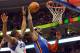 PHILADELPHIA, PA - MARCH 21: Amare Stoudemire #1 of the New York Knicks dunks on Thaddeus Young #21 of the Philadelphia 76ers at the Wells Fargo Center on March 21, 2012 in Philadelphia, Pennsylvania. NOTE TO USER: User expressly acknowledges and agrees that, by downloading and or using this photograph, User is consenting to the terms and conditions of the Getty Images License Agreement. (Photo by Drew Hallowell/Getty Images)