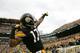 PITTSBURGH, PA - DECEMBER 04: Mike Wallace #17 of the Pittsburgh Steelers celebrates following his touchdown against the Cincinnati Bengals in the first half during the game on December 4, 2011 at Heinz Field in Pittsburgh, Pennsylvania. (Photo by Jared Wickerham/Getty Images)