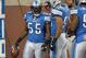 DETROIT, MI - DECEMBER 11: Stephen Tulloch #55 of the Detroit Lions celebrates a first quarter touchdown with teammates DeAndre Levy #54 and Corey Williams #99 while playing the Minnesota Vikings at Ford Field on December 11, 2011 in Detroit, Michigan. (Photo by Gregory Shamus/Getty Images)