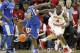 BLOOMINGTON, IN - DECEMBER 10: Victor Oladipo #4 of the Indiana Hoosiers and Doron Lamb #20 of the Kentucky Wildcats battle for a loose ballduring the Indiana 73-72 victory at Assembly Hall on December 10, 2011 in Bloomington, Indiana. (Photo by Andy Lyons/Getty Images)
