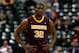 INDIANAPOLIS, IN - MARCH 10: Trevor Mbakwe #32 of the Minnesota Golden Gophers looks on against the Northwestern Wildcats during the first round of the 2011 Big Ten Men's Basketball Tournament at Conseco Fieldhouse on March 10, 2011 in Indianapolis, Indiana. Northwestern won 75-65. (Photo by Chris Chambers/Getty Images)