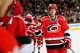 RALEIGH, NC - FEBRUARY 28: Eric Staal #12 of the Carolina Hurricanes celebrates with teammates after scoring a second-period goal against the Nashville Predators during play at the RBC Center on February 28, 2012 in Raleigh, North Carolina. (Photo by Grant Halverson/Getty Images)