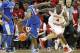BLOOMINGTON, IN - DECEMBER 10: Victor Oladipo #4 of the Indiana Hoosiers and Doron Lamb #20 of the Kentucky Wildcats battle for a loose ballduring the Indiana 73-72 victory at Assembly Hall on December 10, 2011 in Bloomington, Indiana. (Photo by Andy Lyons/Getty Images)