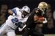 NEW ORLEANS, LA - DECEMBER 04: Running back Maurice Morris #28 of the Detroit Lions looks to tackle cornerback Tracy Porter #22 of the New Orleans Saints after intercepting a pass in the fourth quarter at Mercedes-Benz Superdome on December 4, 2011 in New Orleans, Louisiana. (Photo by Chris Graythen/Getty Images)