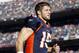 DENVER, CO - DECEMBER 18: Tim Tebow #15 of the Denver Broncos heads to the locker room before playing the New England Patriots on December 18, 2011 at Sports Authority Field at Mile High in Denver, Colorado. (Photo by Marc Piscotty/Getty Images)
