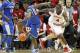 BLOOMINGTON, IN - DECEMBER 10: Victor Oladipo #4 of the Indiana Hoosiers and Doron Lamb #20 of the Kentucky Wildcats battle for a loose ballduring the Indiana 73-72 victory at Assembly Hall on December 10, 2011 in Bloomington, Indiana. (Photo by Andy Lyons/Getty Images)