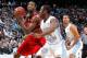 ATLANTA, GA - MARCH 10: C.J. Leslie #5 of the North Carolina State Wolfpack drives against Justin Watts #24 of the North Carolina Tar Heels during the semifinals of the 2012 ACC Men's Basketball Conference Tournament at Philips Arena on March 10, 2012 in Atlanta, Georgia. (Photo by Kevin C. Cox/Getty Images)