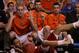 BOSTON, MA - MARCH 22: Ryan Evans #5 of the Wisconsin Badgers crashes into the Syracuse Orange bench while trying to save a ball from going out of bounds during their 2012 NCAA Men's Basketball East Regional Semifinal game at TD Garden on March 22, 2012 in Boston, Massachusetts. (Photo by Elsa/Getty Images)
