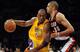 LOS ANGELES, CA - FEBRUARY 20: Kobe Bryant #24 of the Los Angeles Lakers drives to the basket on Nicolas Batum #88 of the Portland Trail Blazers during the game at Staples Center on February 20, 2012 in Los Angeles, California. NOTE TO USER: User expressly acknowledges and agrees that, by downloading and or using this photograph, User is consenting to the terms and conditions of the Getty Images License Agreement. (Photo by Harry How/Getty Images)