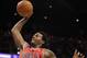 PHOENIX - NOVEMBER 24: James Johnson #16 of the Chicago Bulls goes up for a slam dunk over Channing Frye #8 of the Phoenix Suns during the NBA game at US Airways Center on November 24, 2010 in Phoenix, Arizona. NOTE TO USER: User expressly acknowledges and agrees that, by downloading and or using this photograph, User is consenting to the terms and conditions of the Getty Images License Agreement. (Photo by Christian Petersen/Getty Images)