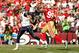 SAN FRANCISCO - NOVEMBER 14: Sam Bradford #8 of the St. Louis Rams is chased by Manny Lawson #99 of the San Francisco 49ers at Candlestick Park on November 14, 2010 in San Francisco, California. (Photo by Ezra Shaw/Getty Images)
