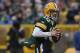 GREEN BAY, WI - JANUARY 01: Matt Flynn #10 of the Green Bay Packers rolls out to look for a receiver against the Detroit Lions at Lambeau Field on January 1, 2012 in Green Bay, Wisconsin. The Packers defeated the Lions 45-41. (Photo by Jonathan Daniel/Getty Images)