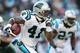 EAST RUTHERFORD, NJ - NOVEMBER 29: Captain Munnerlyn #41 of the Carolina Panthers rushes against the New York Jets at Giants Stadium on November 29, 2009 in East Rutherford, New Jersey. (Photo by Nick Laham/Getty Images)