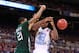 ST. LOUIS, MO - MARCH 23: Harrison Barnes #40 of the North Carolina Tar Heels loses the ball in the second half as he is defended by Jon Smith #21 of the Ohio Bobcats during the 2012 NCAA Men's Basketball Midwest Regional Semifinal at Edward Jones Dome on March 23, 2012 in St. Louis, Missouri. (Photo by Andy Lyons/Getty Images)