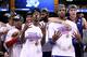 ST LOUIS, MO - MARCH 25: (from 2nd L) Tyshawn Taylor #10 and Thomas Robinson #0 (R of Taylor) of the Kansas Jayhawks gesture the number four for their upcoming trip to the Final Four after they won 80-67 against the North Carolina Tar Heels during the 2012 NCAA Men's Basketball Midwest Regional Final at Edward Jones Dome on March 25, 2012 in St Louis, Missouri. (Photo by Andy Lyons/Getty Images)