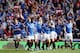 GLASGOW, SCOTLAND - MARCH 25: Lee Wallace of Rangers celebrates with team-mates after scoring his team's third goal during the Clydesdale Bank Scottish Premier League match between Rangers and Celtic at Ibrox Stadium on March 25, 2012 in Glasgow, Scotland. (Photo by Ian Walton/Getty Images)