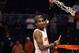 PHOENIX, AZ - MARCH 24: Chris Smith #5 of the Louisville Cardinals cuts down the net after defeating the Florida Gators 72-68 during the 2012 NCAA Men's Basketball West Regional Final at US Airways Center on March 24, 2012 in Phoenix, Arizona. (Photo by Christian Petersen/Getty Images)