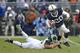 STATE COLLEGE, PA - NOVEMBER 27: Wide receiver Devon Smith #20 of the Penn State Nittany Lions runs with the ball during a game against the Michigan State Spartans on November 27, 2010 at Beaver Stadium in State College, Pennsylvania. The Spartans won 28-22. (Photo by Hunter Martin/Getty Images)