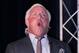 CONCORD, NC - JANUARY 20: Former American Professional Wrestler Ric Flair performs his famous yell 'Wooooo!', for the media during the NASCAR Sprint Media Tour hosted by Charlotte Motor Speedway, held at the Embassy Suites, on January 20, 2010 in Concord, North Carolina. (Photo by Jason Smith/Getty Images)