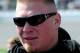 DAYTONA BEACH, FL - FEBRUARY 13: MMA fighter Brock Lesnar walks in the garage area during the NASCAR Nationwide Series Drive4COPD 300 at Daytona International Speedway on February 13, 2010 in Daytona Beach, Florida. (Photo by Sam Greenwood/Getty Images)