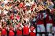 LONDON, ENGLAND - MARCH 24: Fans react after Theo Walcott of Arsenal scores during the Barclays Premier League match between Arsenal and Aston Villal at Emirates Stadium on March 24, 2012 in London, England. (Photo by Julian Finney/Getty Images)