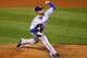ST LOUIS, MO - OCTOBER 28: Mike Gonzalez #51 of the Texas Rangers pitches in the eighth inning during Game Seven of the MLB World Series against the St. Louis Cardinals at Busch Stadium on October 28, 2011 in St Louis, Missouri. (Photo by Dilip Vishwanat/Getty Images)