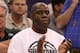 PHOENIX, AZ - MARCH 22: Basketball hall-of-famer Earvin 'Magic' Johnson cheers on his alma mater the Michigan State Spartans as the Spartans take on the Louisville Cardinals during the 2012 NCAA Men's Basketball West Regional Semifinal game at US Airways Center on March 22, 2012 in Phoenix, Arizona. (Photo by Christian Petersen/Getty Images)