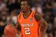 PHOENIX, AZ - MARCH 22: Russ Smith #2 of the Louisville Cardinals moves the ball while taking on the Michigan State Spartans during the 2012 NCAA Men's Basketball West Regional Semifinal game at US Airways Center on March 22, 2012 in Phoenix, Arizona. (Photo by Jamie Squire/Getty Images)