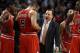 BOSTON, MA - JANUARY 13: Head coach Tom Thibodeau talks with his players during a time out in the fourth quarter against the Boston Celtics on January 13, 2012 at TD Garden in Boston, Massachusetts. The Chicago Bulls defeated the Boston Celtics 88-79. NOTE TO USER: User expressly acknowledges and agrees that, by downloading and or using this photograph, User is consenting to the terms and conditions of the Getty Images License Agreement. (Photo by Elsa/Getty Images)