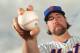 PORT ST. LUCIE, FL - MARCH 02: Pitcher R.A. Dickey #43 of the New York Mets poses for photos during MLB photo day on March 2, 2012 in Port St. Lucie, Florida. (Photo by Marc Serota/Getty Images)