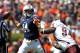 AUBURN, AL - SEPTEMBER 10: Quarterback Barrett Trotter #14 of the Auburn Tigers throws a pass while under pressure from defensive lineman Fletcher Cox #94 of the Mississippi State Bulldogs in the first quarter on September 10, 2011 at Jordan-Hare Stadium in Auburn, Alabama. (Photo by Butch Dill/Getty Images)
