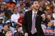 Kendall Marshall coaches from the bench after a broken right wrist kept him out of action in the Tar Heels' Elite Eight loss to Kansas.