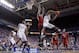 LEXINGTON, KY - DECEMBER 31: Marquis Teague #25 of the Kentucky Wildcats shoots the ball while defended by Gorgui Dieng #10 of the Louisville Cardinals during the game at Rupp Arena on December 31, 2011 in Lexington, Kentucky. (Photo by Andy Lyons/Getty Images)