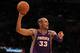 LOS ANGELES, CA - JANUARY 10: Grant Hill #33 of the Phoenix Suns holds the ball as he directs the offense against the Los Angeles Lakers at Staples Center on January 10, 2012 in Los Angeles, California. The Lakers won 99-83. NOTE TO USER: User expressly acknowledges and agrees that, by downloading and or using this photograph, User is consenting to the terms and conditions of the Getty Images License Agreement. (Photo by Stephen Dunn/Getty Images)