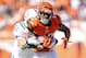 CINCINNATI, OH - OCTOBER 16: Andre Caldwell #87 of the Cincinnati Bengals runs with the ball while defended by Pat Angerer #51 of the Indianapolis Colts during the NFL game at Paul Brown Stadium on October 16, 2011 in Cincinnati, Ohio. The Bengals won 27-17. (Photo by Andy Lyons/Getty Images)