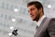 FLORHAM PARK, NJ - MARCH 26: Quarterback Tim Tebow addresses the media as he is introduced as a New York Jet at the Atlantic Health Jets Training Center on March 26, 2012 in Florham Park, New Jersey. Tebow, traded from the Denver Broncos last week, will be the team's backup quarterback according to Jets head coach Rex Ryan. Tebow, the 2007 Heisman Trophy winner, started 11 games in 2011 for Denver and finished with a 7-4 record as a starter. He led the Broncos to a playoff overtime win against the Pittsburgh Steelers in the first round before eventually losing to the New England Patriots in the next round. (Photo by Mike Stobe/Getty Images)