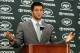 FLORHAM PARK, NJ - MARCH 26: Quarterback Tim Tebow addresses the media as he is introduced as a New York Jet at the Atlantic Health Jets Training Center on March 26, 2012 in Florham Park, New Jersey. Tebow, traded from the Denver Broncos last week, will be the team's backup quarterback according to Jets head coach Rex Ryan. Tebow, the 2007 Heisman Trophy winner, started 11 games in 2011 for Denver and finished with a 7-4 record as a starter. He led the Broncos to a playoff overtime win against the Pittsburgh Steelers in the first round before eventually losing to the New England Patriots in the next round. (Photo by Mike Stobe/Getty Images)