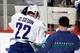 Daniel Sedin is helped off the ice 3/21/12