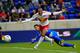 HARRISON, NJ - MARCH 31: Thierry Henry #14 of the New York Red Bulls is challenged by Zarek Valentin #19 of the Montreal Impact at Red Bull Arena on March 31, 2012 in Harrison, New Jersey. (Photo by Chris Trotman/Getty Images)