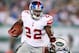 EAST RUTHERFORD, NJ - AUGUST 16: Andre Brown #22 of the New York Giants breaks a tackle against the New York Jets during the preseason game at New Meadowlands Stadium on August 16, 2010 in East Rutherford, New Jersey. The Giants won 31 - 16. (Photo by Andrew Burton/Getty Images)