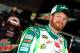 MARTINSVILLE, VA - MARCH 30: Dale Earnhardt Jr., driver of the #88 Amp Energy/National Guard Chevrolet, stands in the garage during practice for the NASCAR Sprint Cup Series Goody's Fast Relief 500 at Martinsville Speedway on March 30, 2012 in Martinsville, Virginia. (Photo by Jeff Zelevansky/Getty Images)