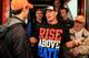 DAYTONA BEACH, FL - FEBRUARY 26: Joey Logano (L), driver of the #20 The Home Depot Toyota, speaks to professional wrestler John Cena in the garage area prior to the start of the NASCAR Sprint Cup Series Daytona 500 at Daytona International Speedway on February 26, 2012 in Daytona Beach, Florida. (Photo by Matthew Stockman/Getty Images)